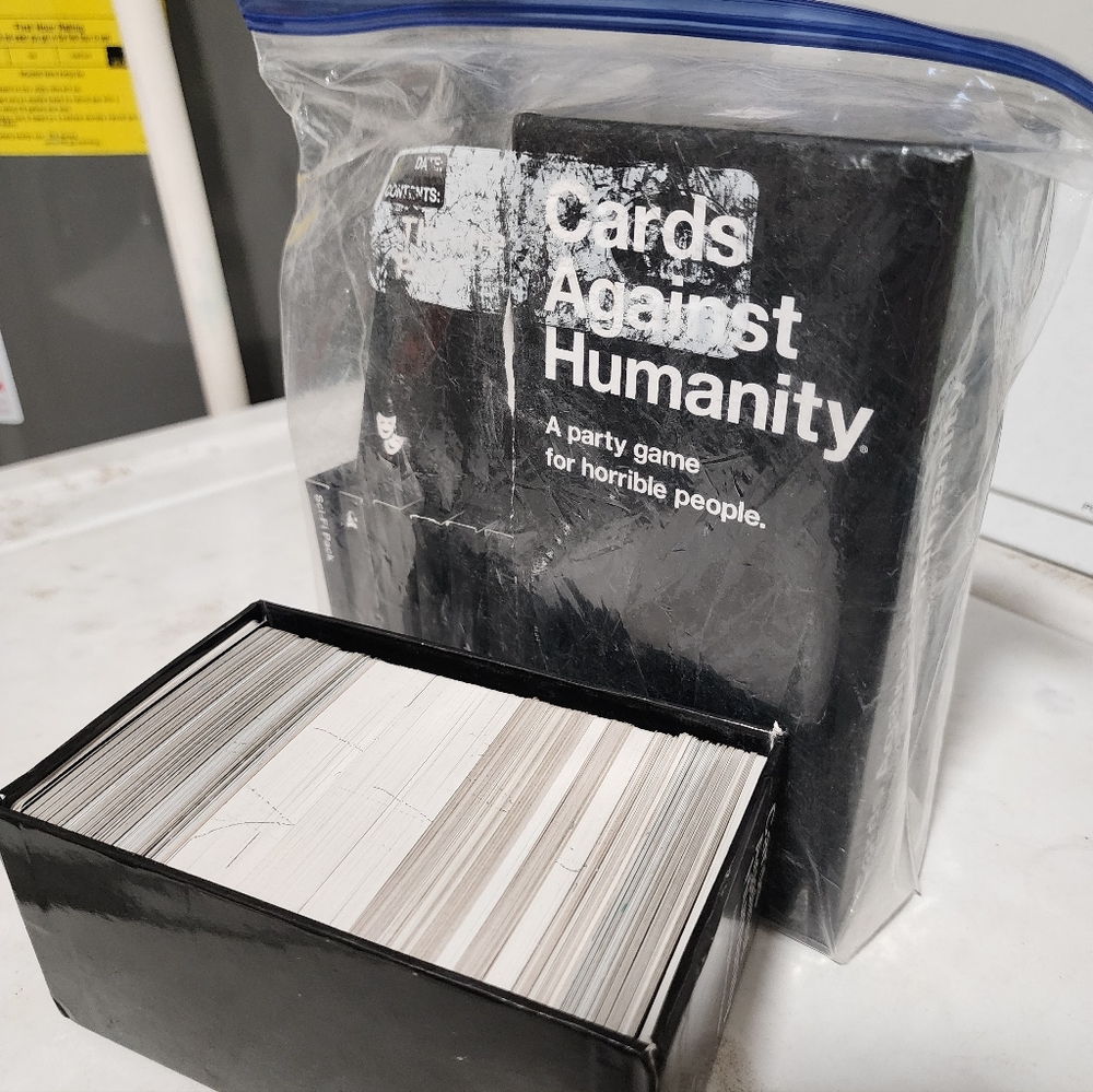 Cards Against Humanity Party Game With Lots Of Boosters.